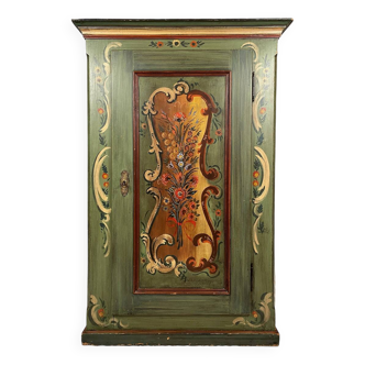 Alsatian bonnet maker in painted softwood with floral decorations