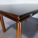 Extendable teak dining table