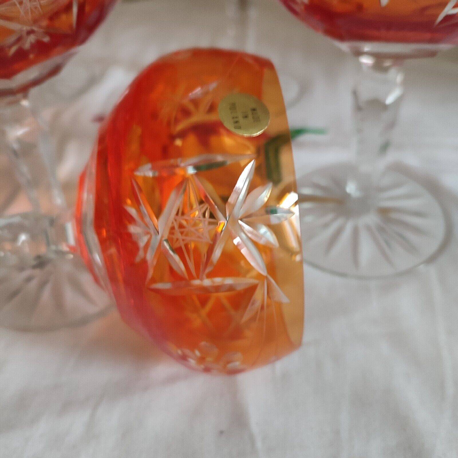 Five antique orange cut crystal champagne glasses with grape cluster decoration Poland