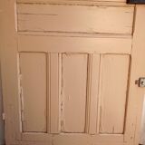 Old glazed door with its shutter