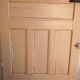 Old glazed door with its shutter