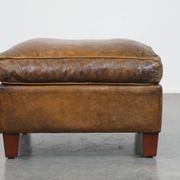 Sheepskin wing chair + XXL patinated footrest