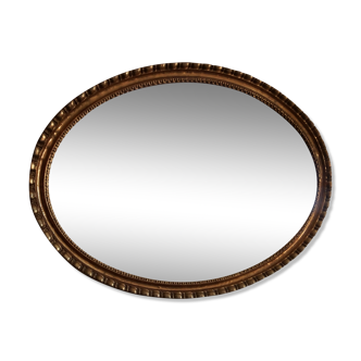 Large antique oval mirror