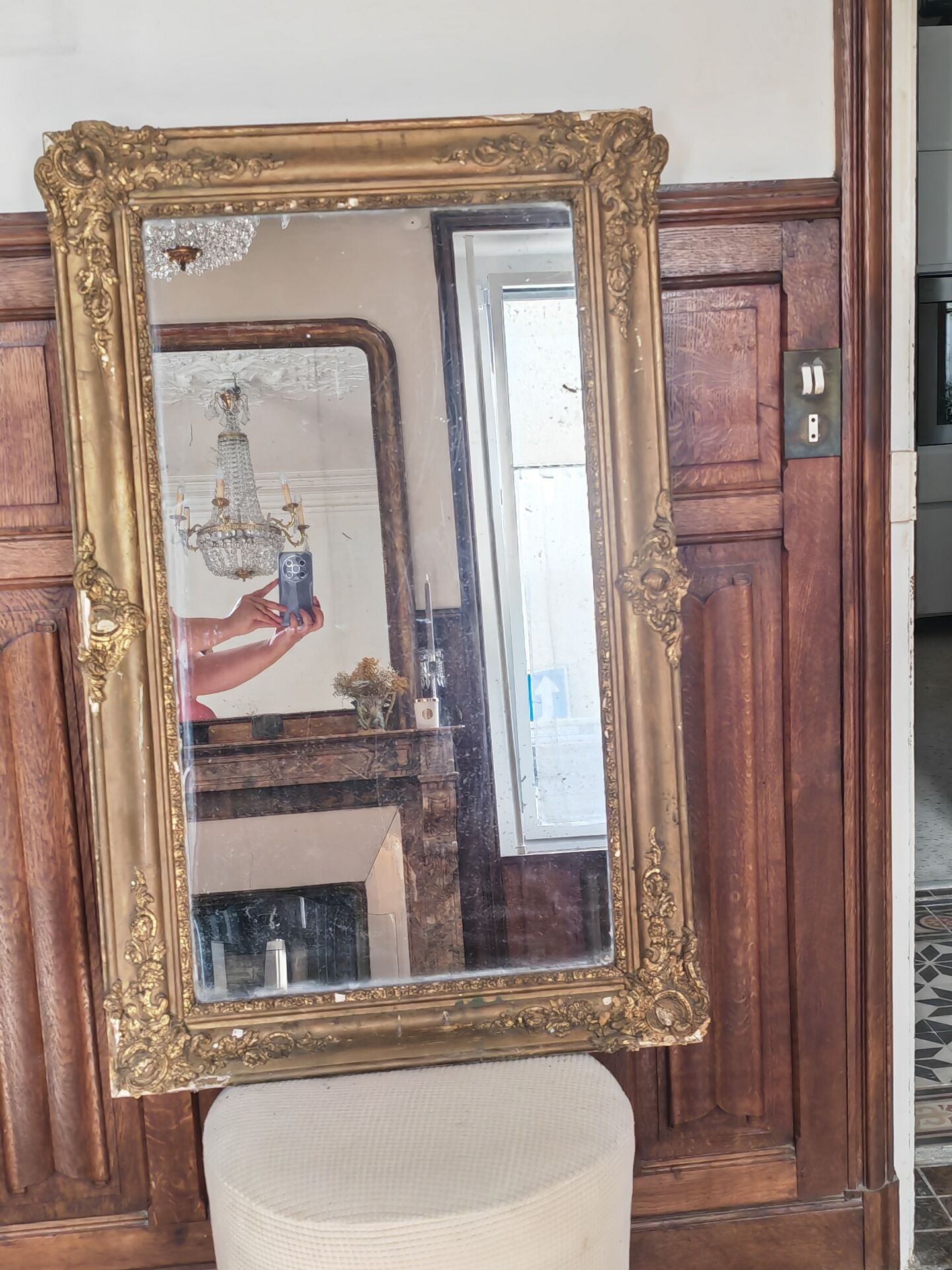 Large gilded mirror from the 19th century.