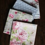 A set of 4 romantic floral polka dot napkins.