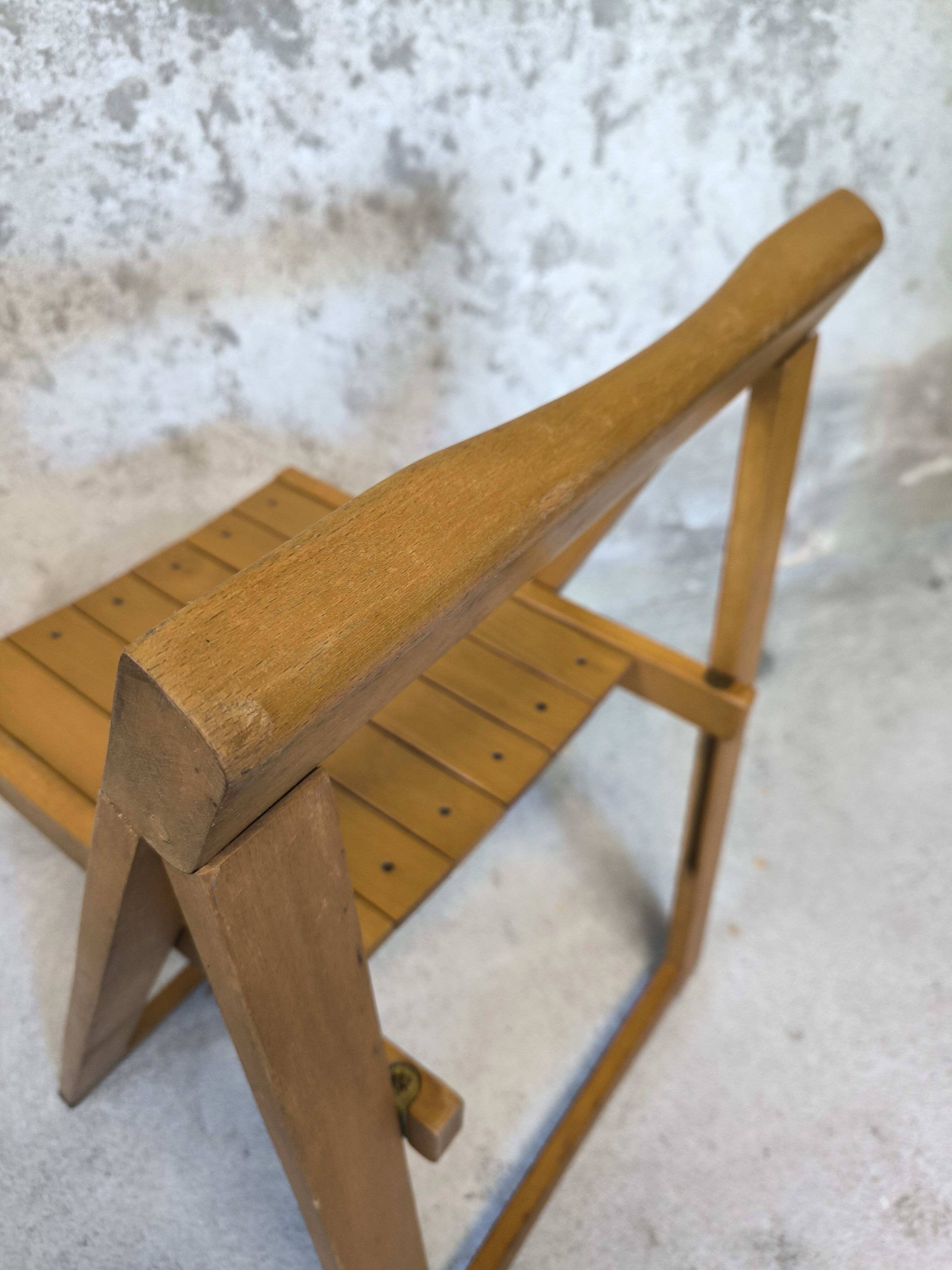 Vintage folding chair in wood by Aldo Jacober