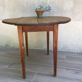 Round table at 2 vintage wood rabats