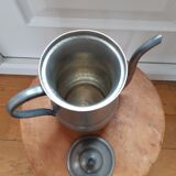 Old tin pourer
