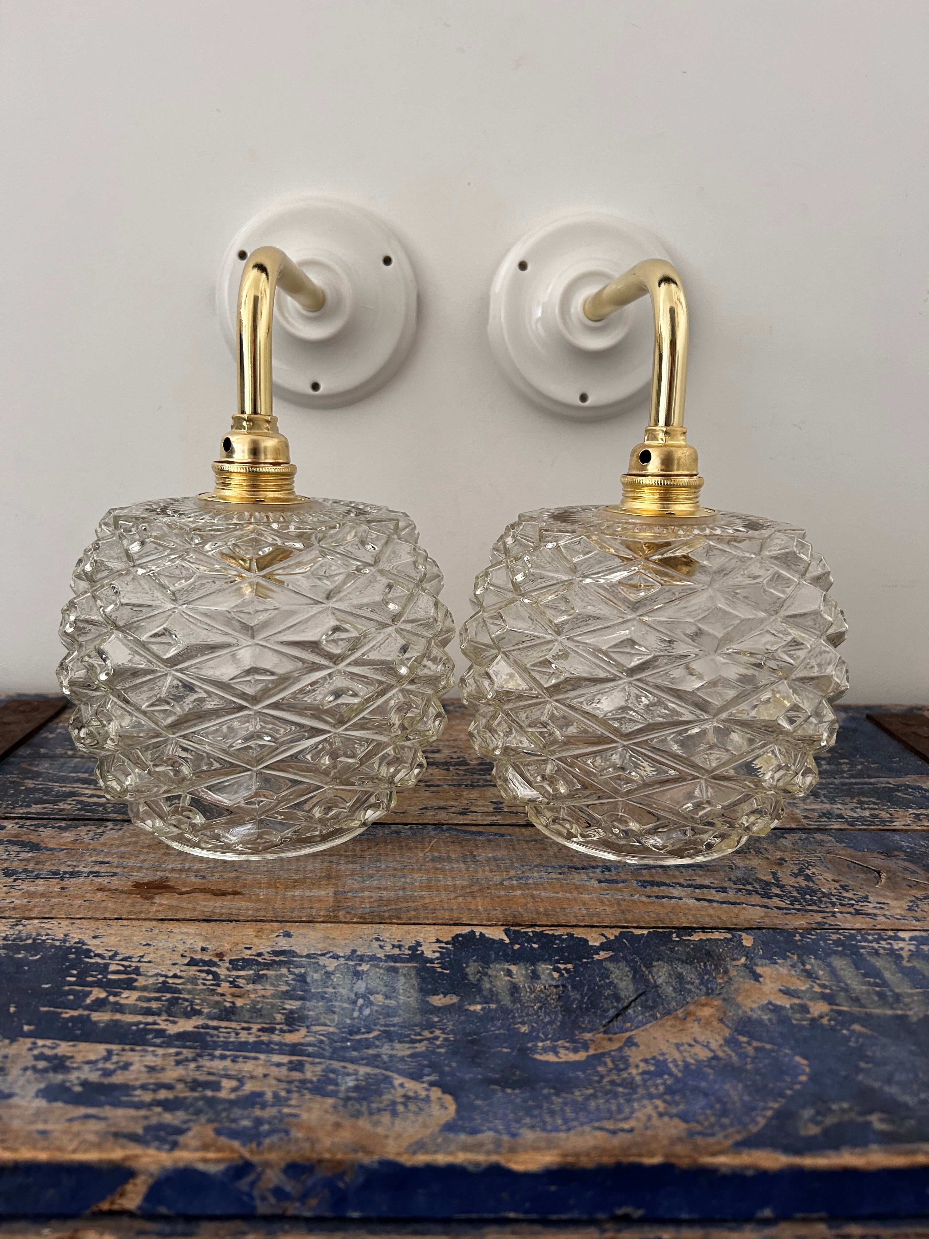 Set of chiseled glass wall sconces