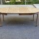 Round extendable dining table Louis XV stripped in solid oak 1950