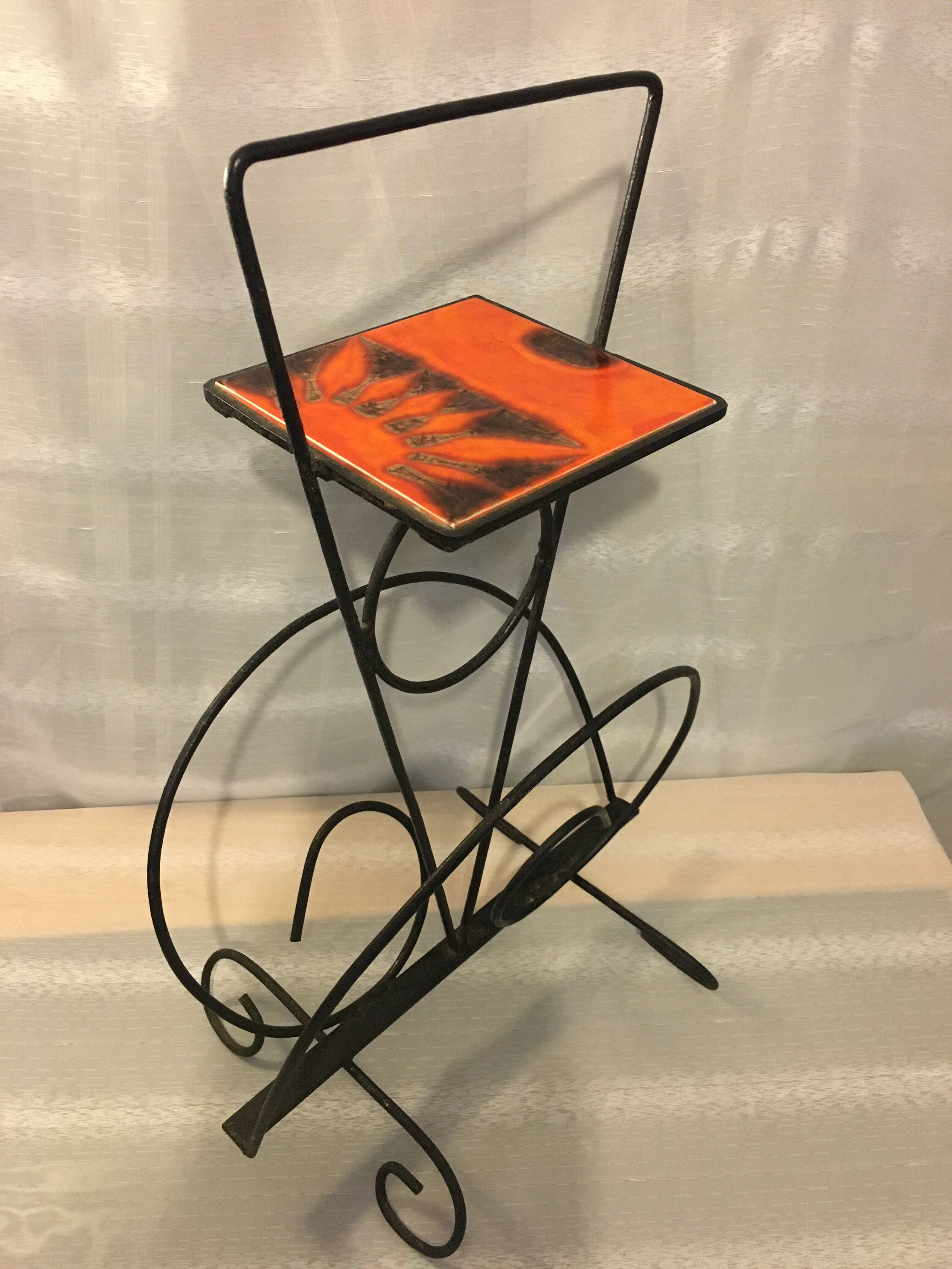 Wrought iron newspaper holder
