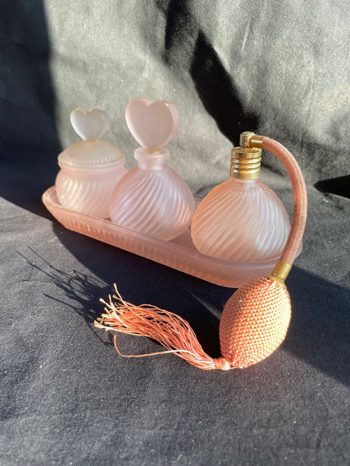 Set of vintage glass pink perfume bathroom jars