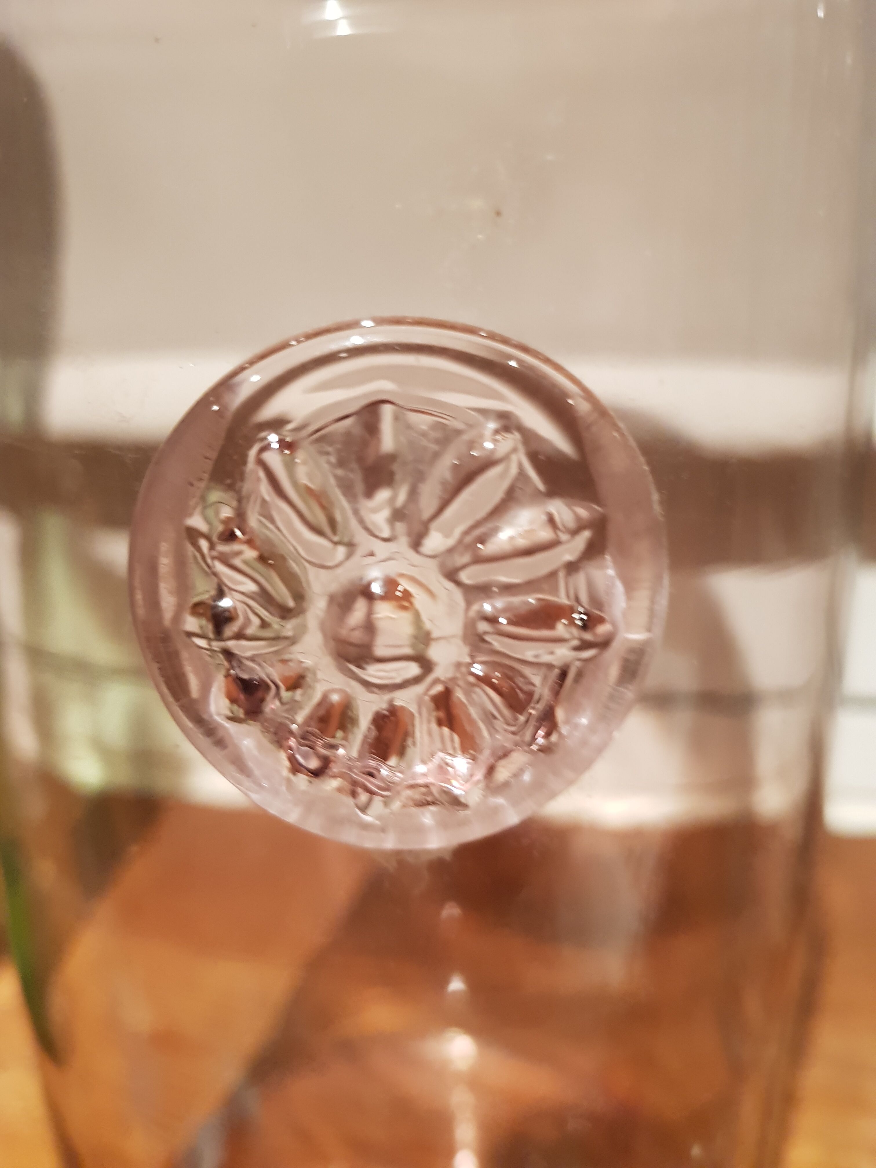 Goose-hued glass apothecary bottle