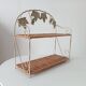 Vintage wall shelf or freestanding wicker in bohemian style.