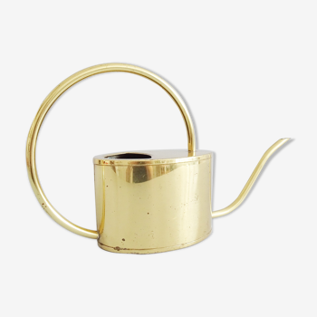 Golden watering can
