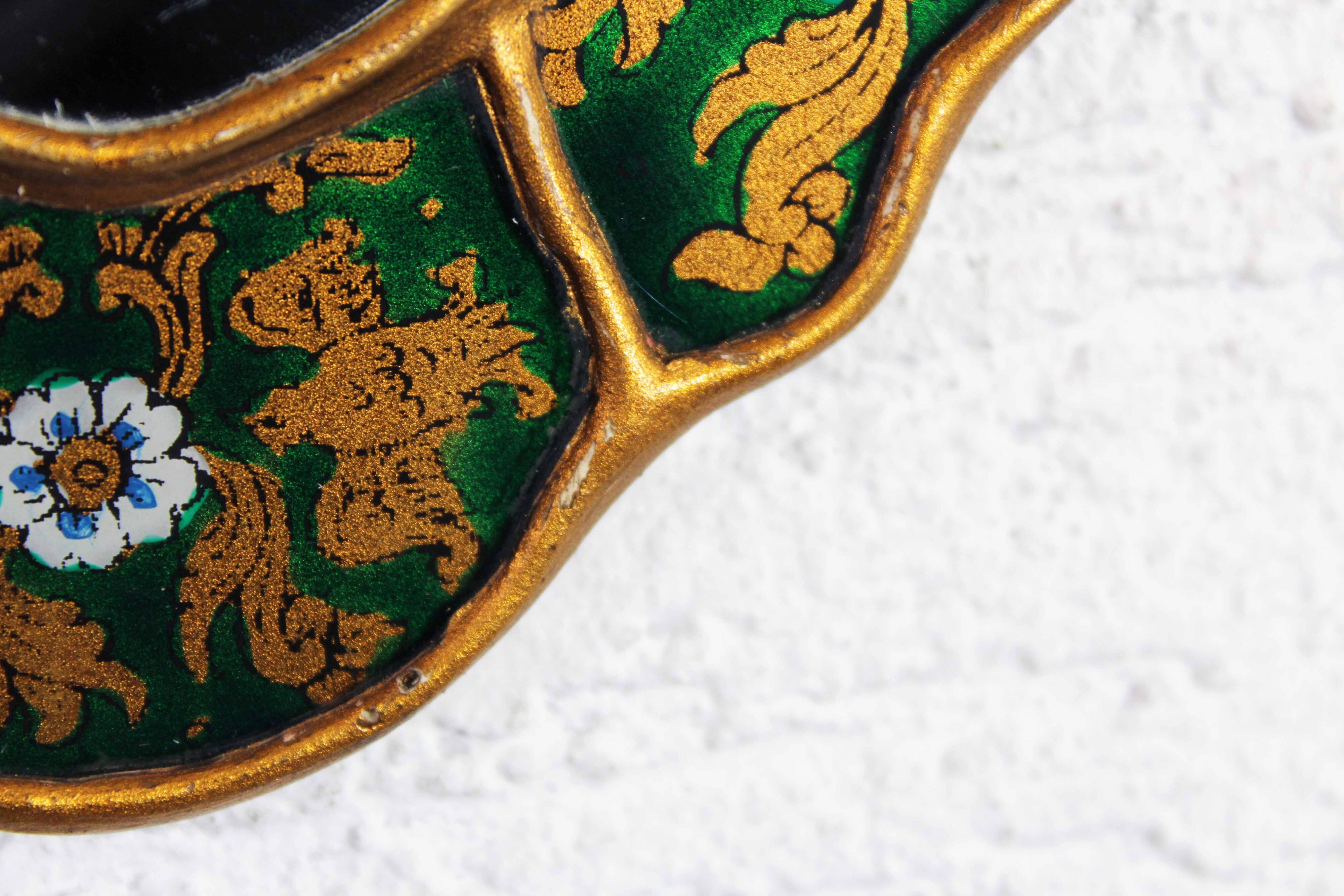 Golden mirror with decor