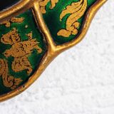 Golden mirror with decor