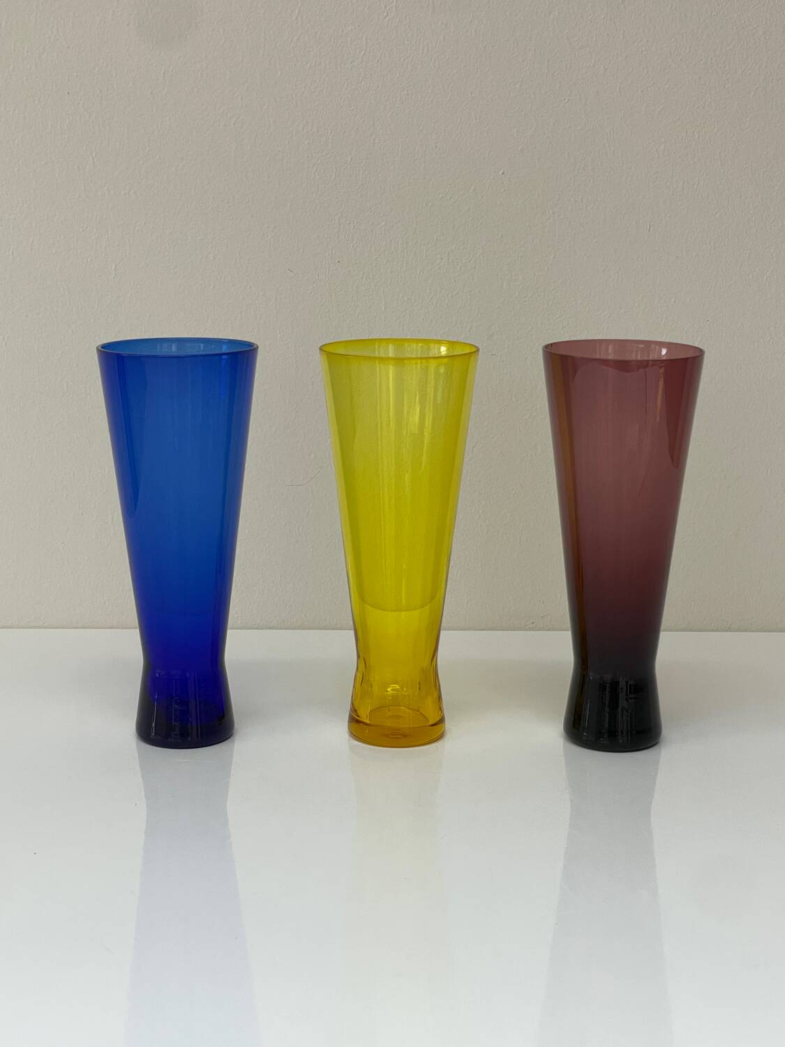 Set of three vintage coloured glasses from the 70s.