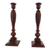 Pair of neoclassical candlesticks in turned and carved wood, France, circa 19
