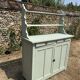 Buffet parisien vintage et son verrier vert d’eau