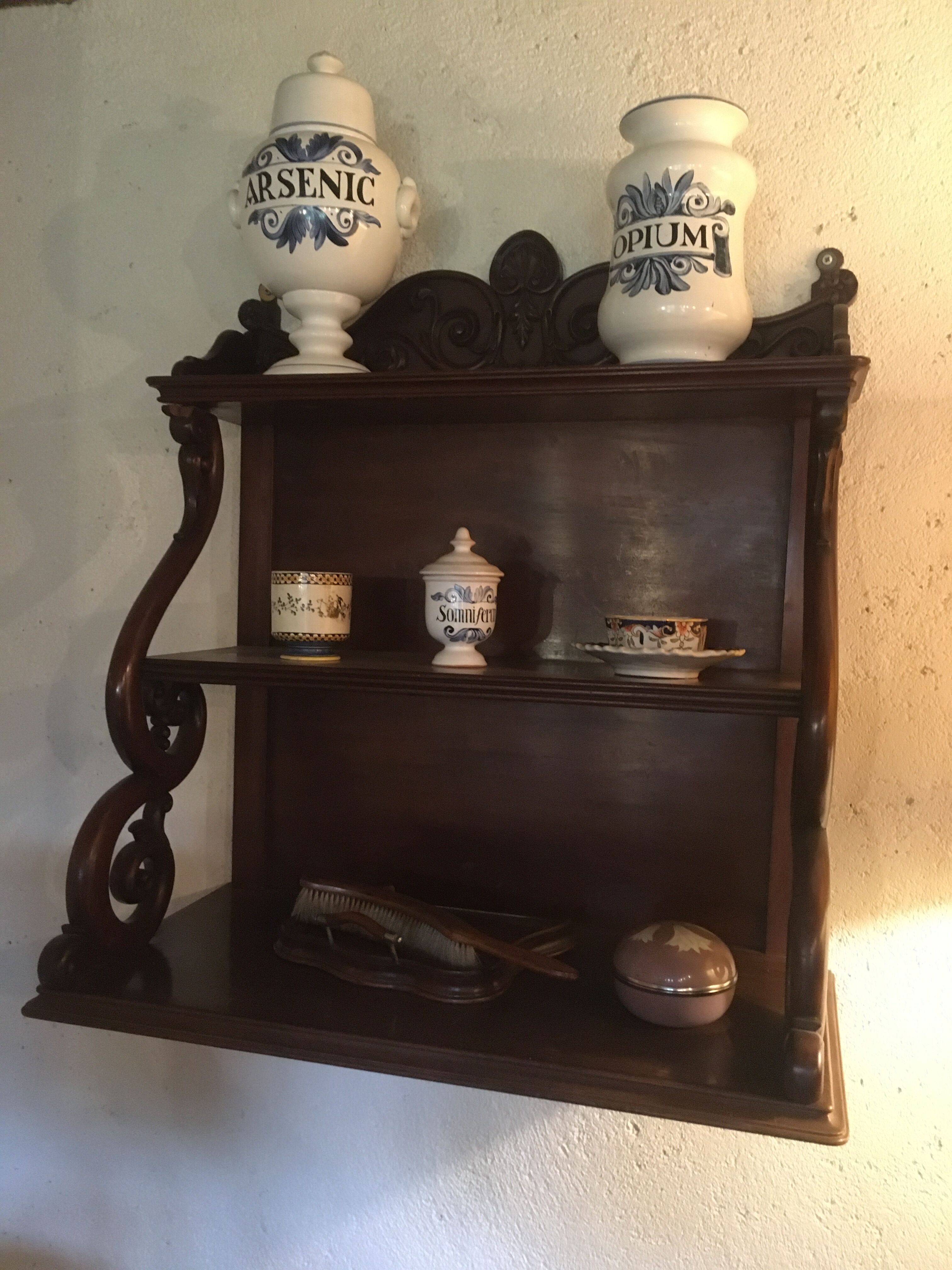 Carved wooden wall shelf.