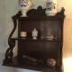 Carved wooden wall shelf.