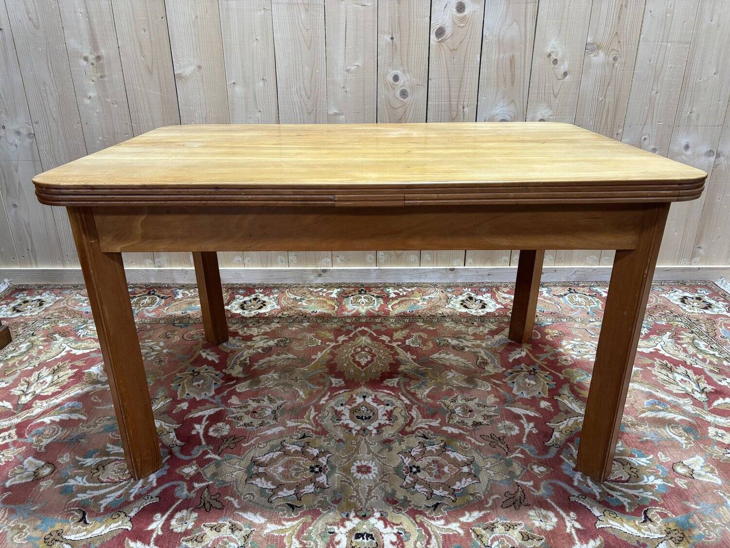 Table with extensions from the 1950s in elm.