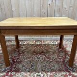 Table with extensions from the 1950s in elm.