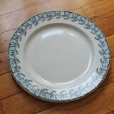 Plat rond en terre de fer décor iris Badonviller