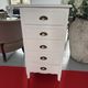 Patinated wooden chest of drawers