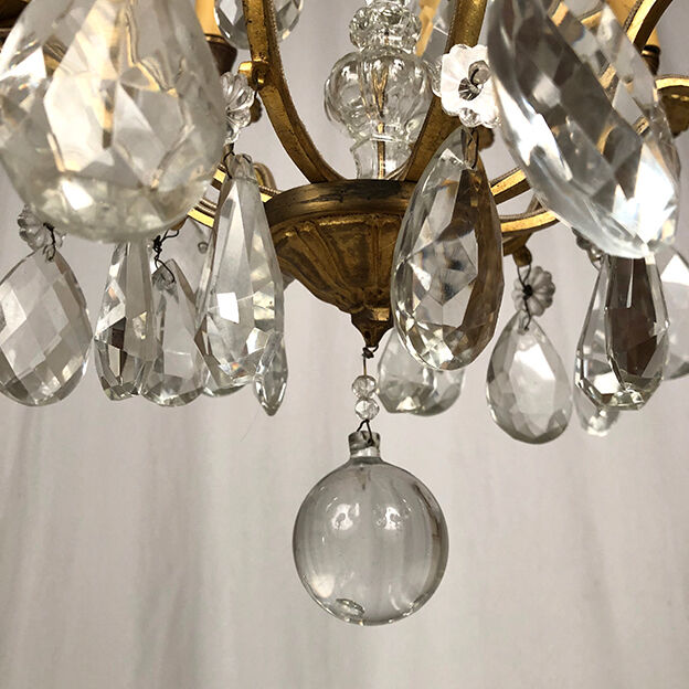 Gilded brass cage chandelier and glass tassels