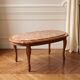 Coffee table with a stone top.