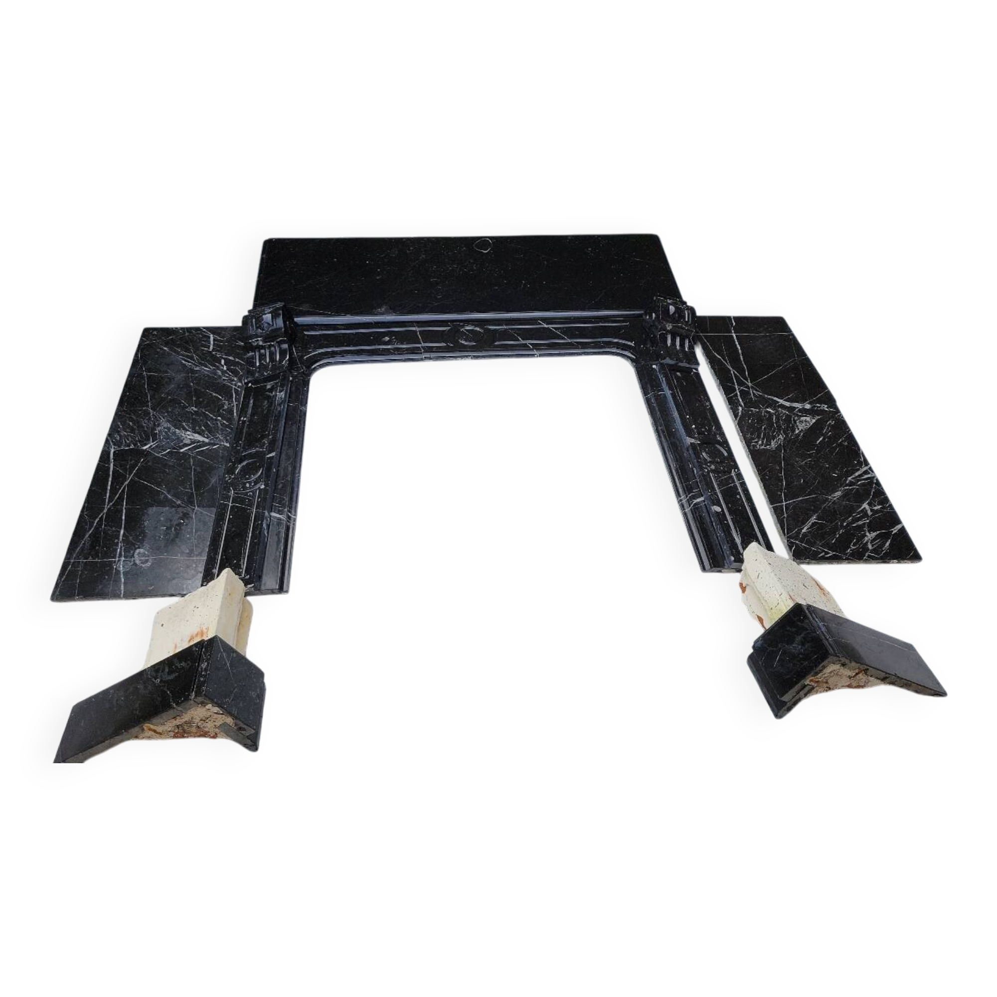 Pompadour fireplace with black marble modillions