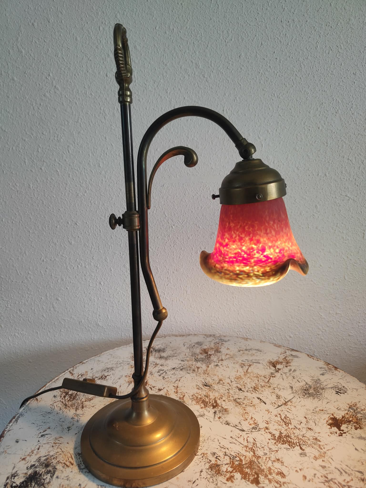 Brass articulated lamp with glass paste signed art of France.