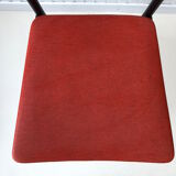 Red metal chairs from the 60s