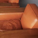 Paire de fauteuils Art Déco en cuir. Années 40.