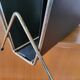 Vintage metal magazine rack in gold and black vinyl Newspaper holder