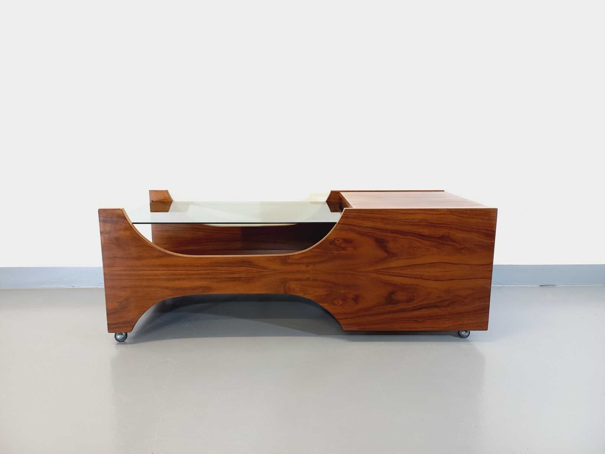 Vintage bar coffee table on rosewood wheels and smoked glass from the 60s