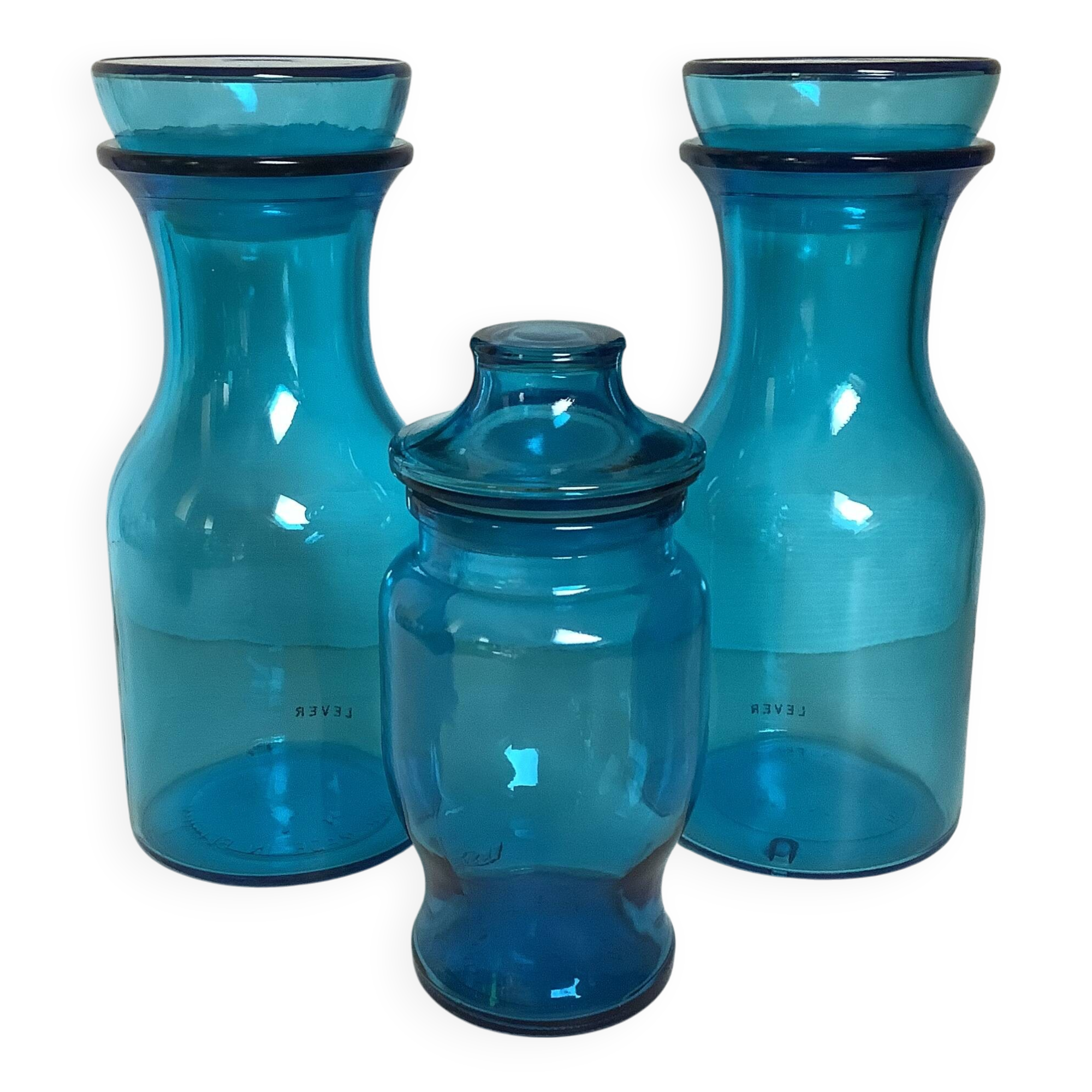 Trio of blue glass candy jars from the 70s