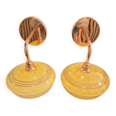 Pair of yellow antique glass wall sconces.