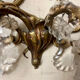 Louis XV style two-light bronze wall light with antique tassels