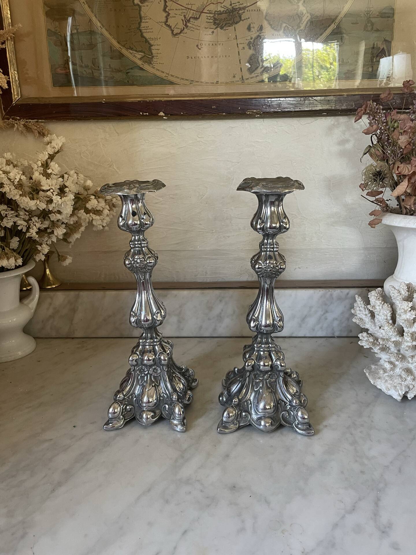 Pair of rococo silver-plated candlesticks