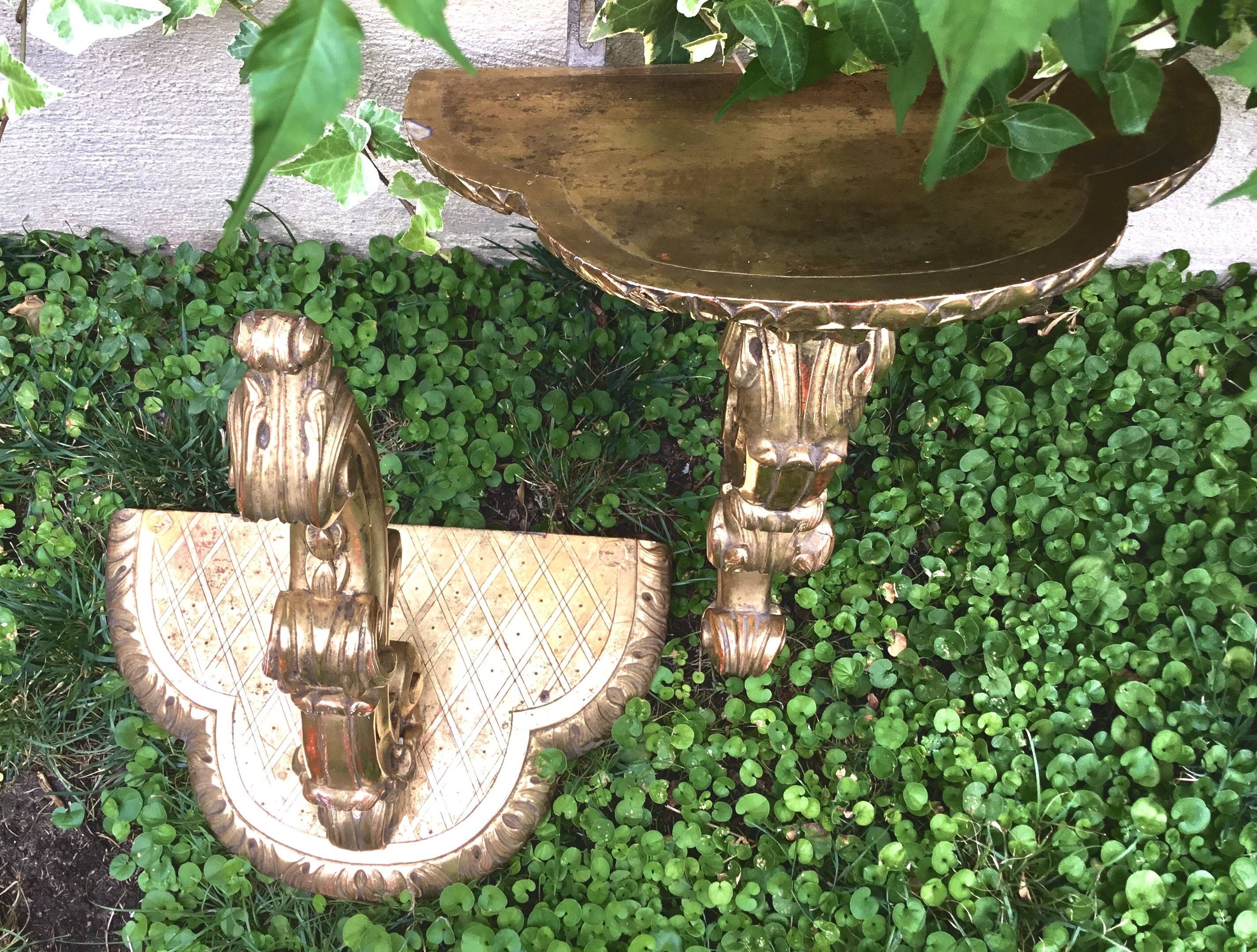 Important, pair of wooden consoles with gilded stucco in Louis XV style. XIX century.