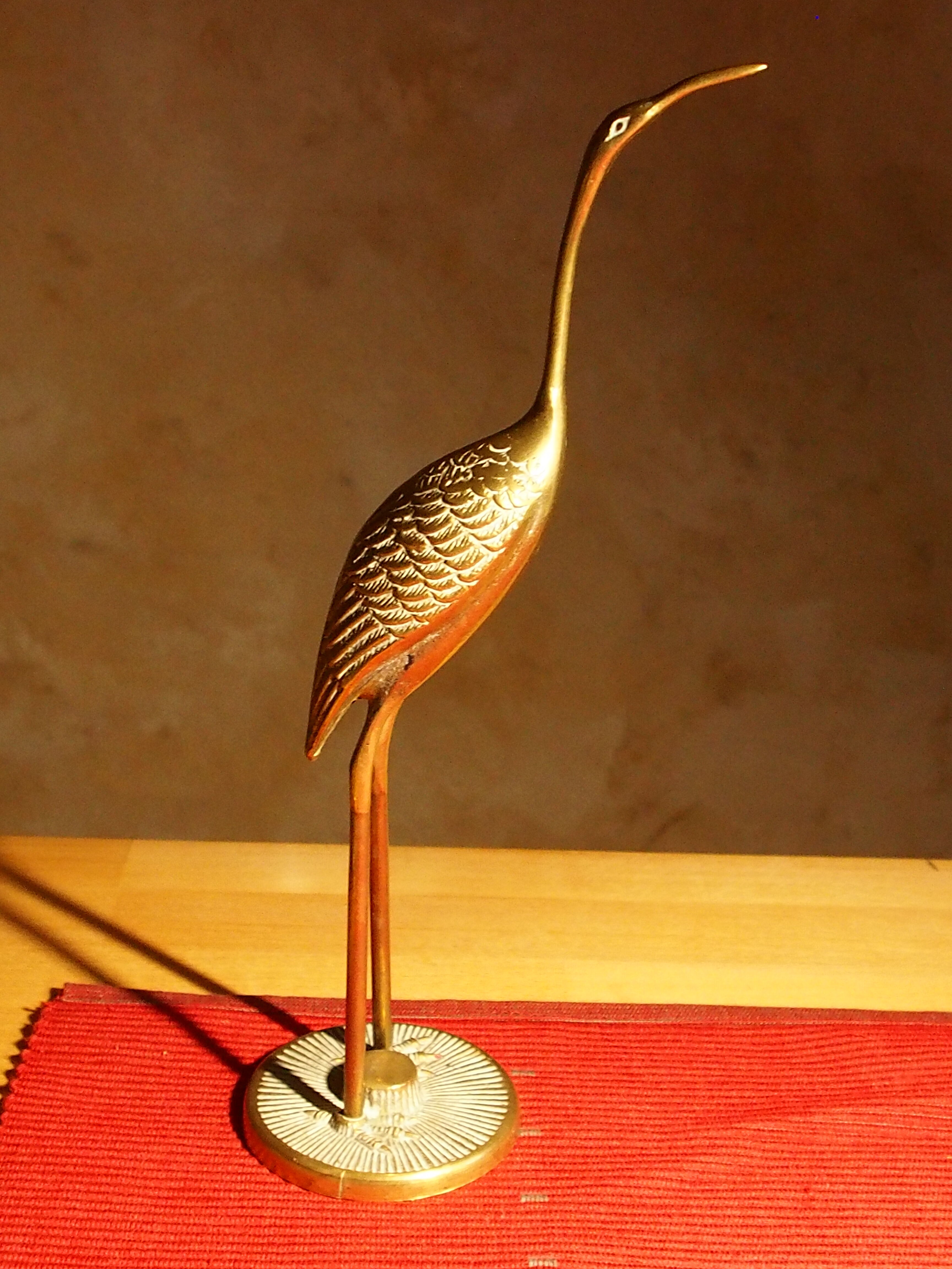 Vintage brass heron