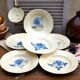 Six Art Deco Digoin earthenware soup bowls with blue rose motif