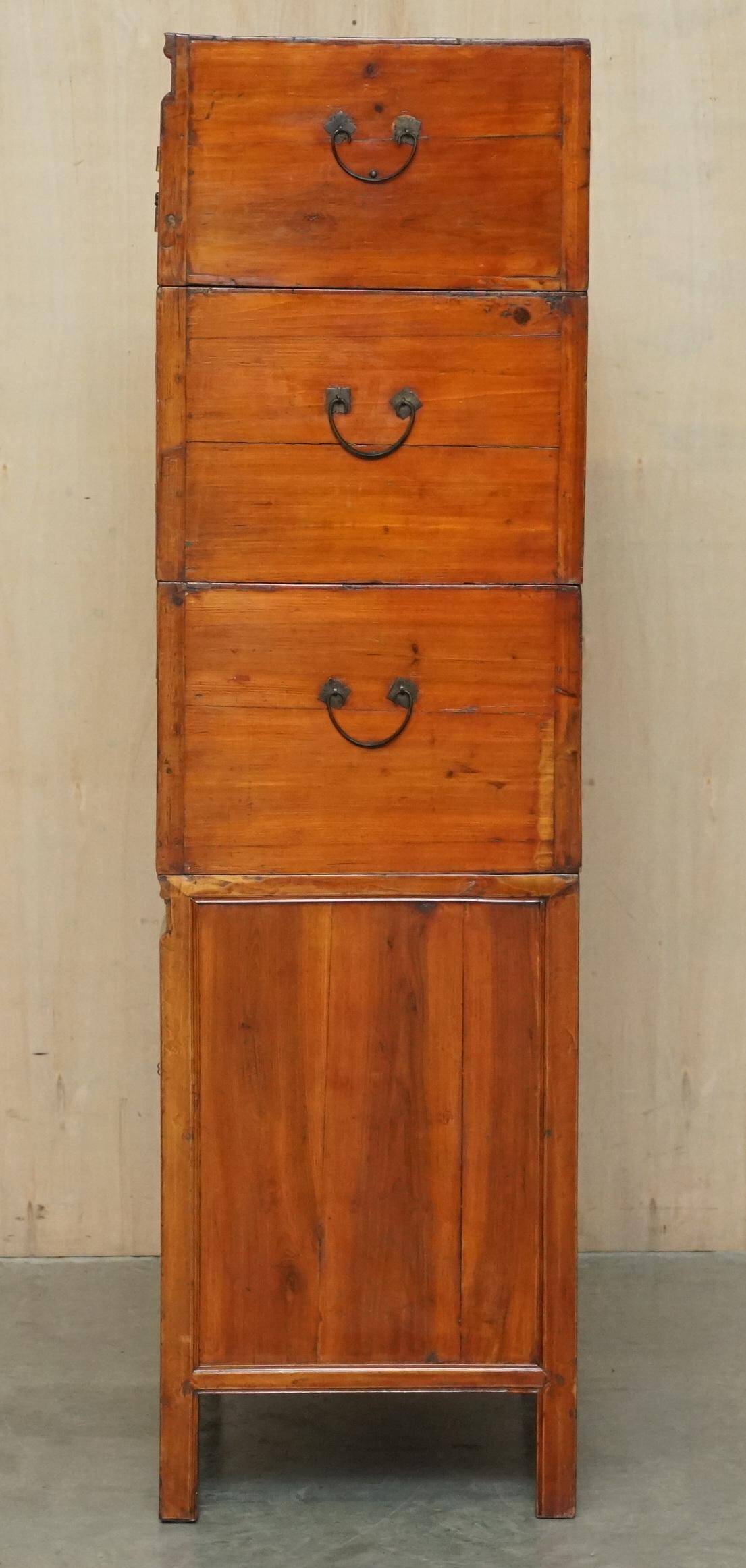 Antique Chinese armoire hand-carved around 1880 with country-style handles.