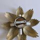Gold metal flower wall light