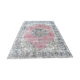 Tapis rose pâle avec médaillon