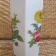 Flowery white porcelain faceted vase