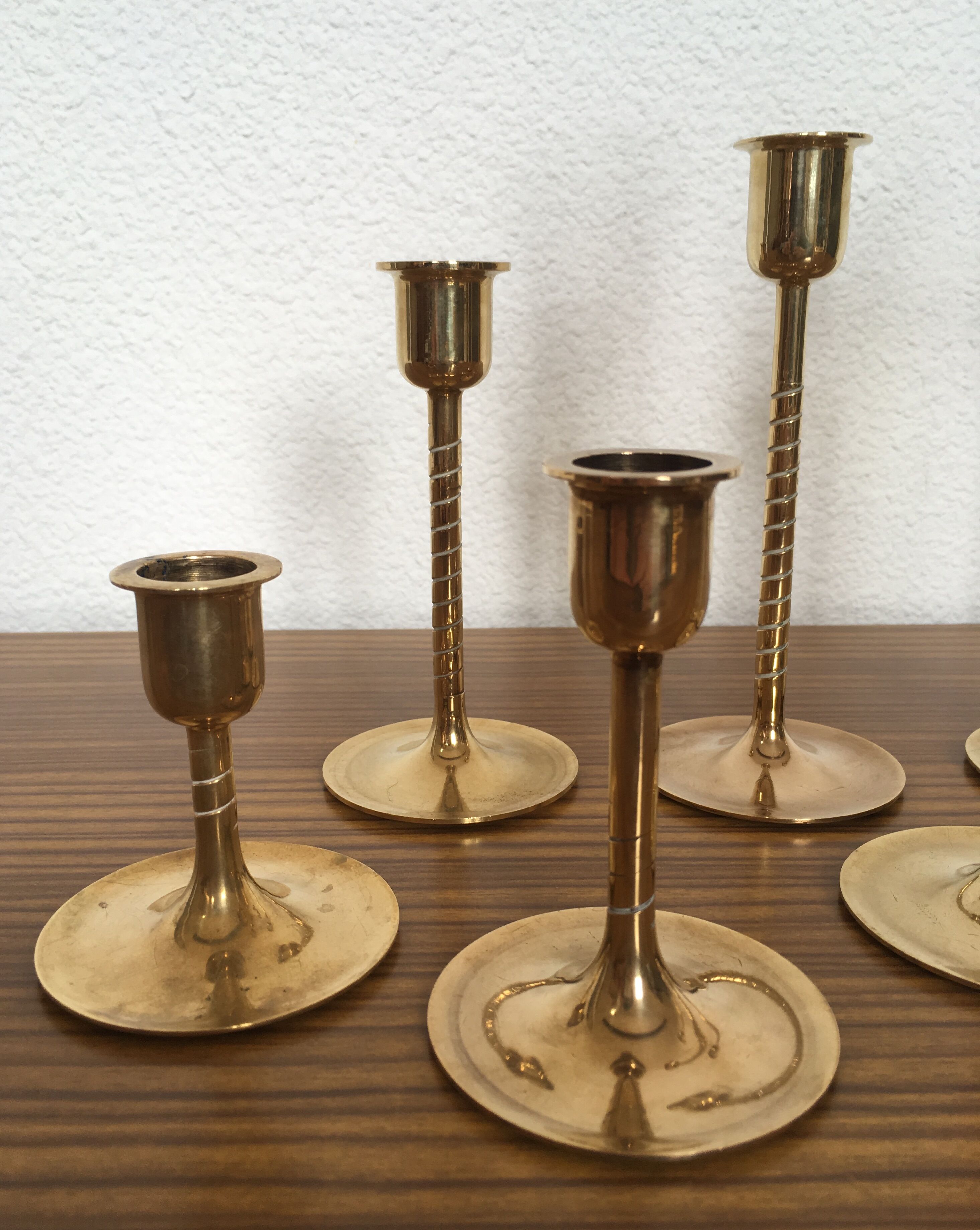 Series of 7 Scandinavian brass candlesticks